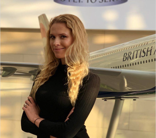 Irra Ariella Khi - credit Irra Ariella Khi Irra Ariella Khi stood in front of a model of a British Airways plane