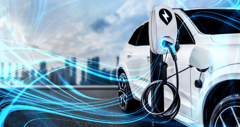 An electric car charging its battery An electric car charging its battery