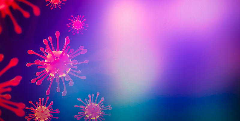 COVID virus shown in lurid purple colours COVID virus shown in lurid purple colours
