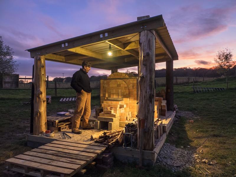 Robin superintending the kiln at night
