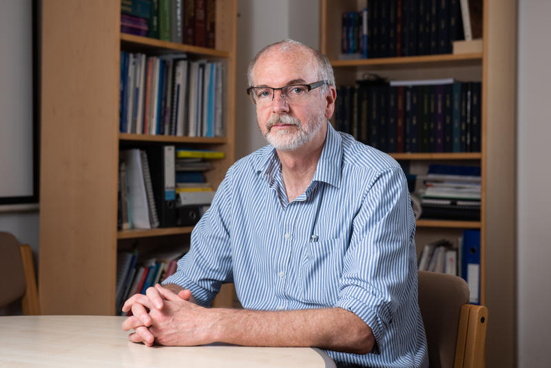 Andrew Pollard - Credit: John Cairns Andrew Pollard seated at a table