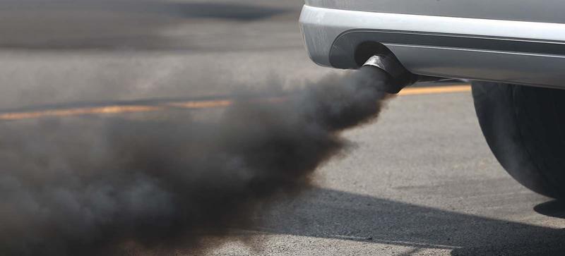 Car exhaust A car emitting a large amount of black smoke from its exhaust