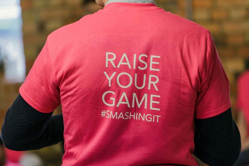 Foundry tshirt back The back of an Oxford Foundry t-shirt, which reads 'Raise your game #smashingit'