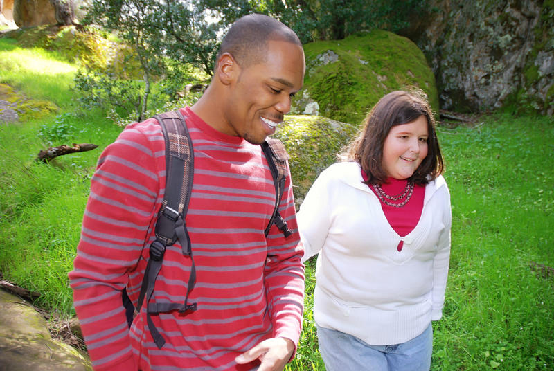 Helper assists visually impaired girl